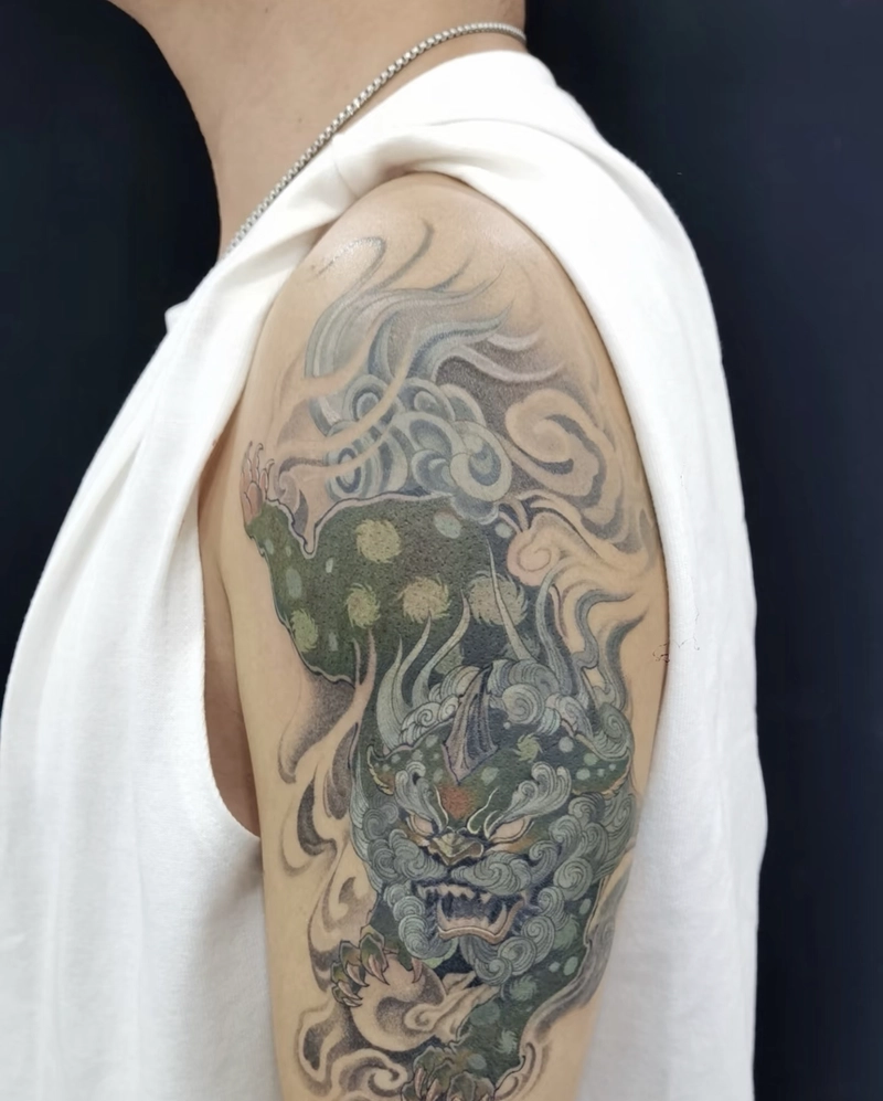 Hình xăm Tỳ Hưu ở bắp tay