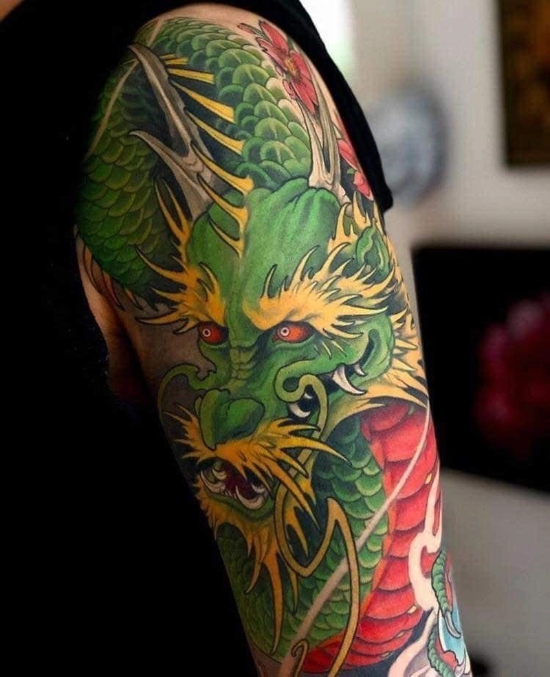 Hình xăm cá chép hóa rồng ở bắp tay