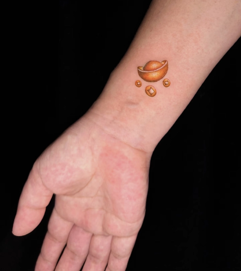 Hình xăm đồng tiền cổ chiêu tài