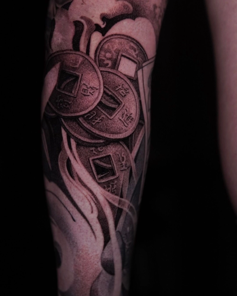 Hình xăm đồng tiền cổ đẹp cho nam