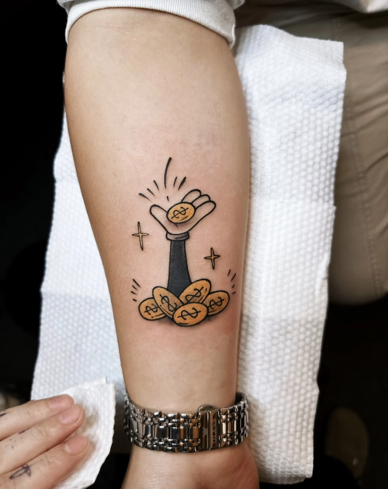 Hình xăm đồng tiền cổ ở tay