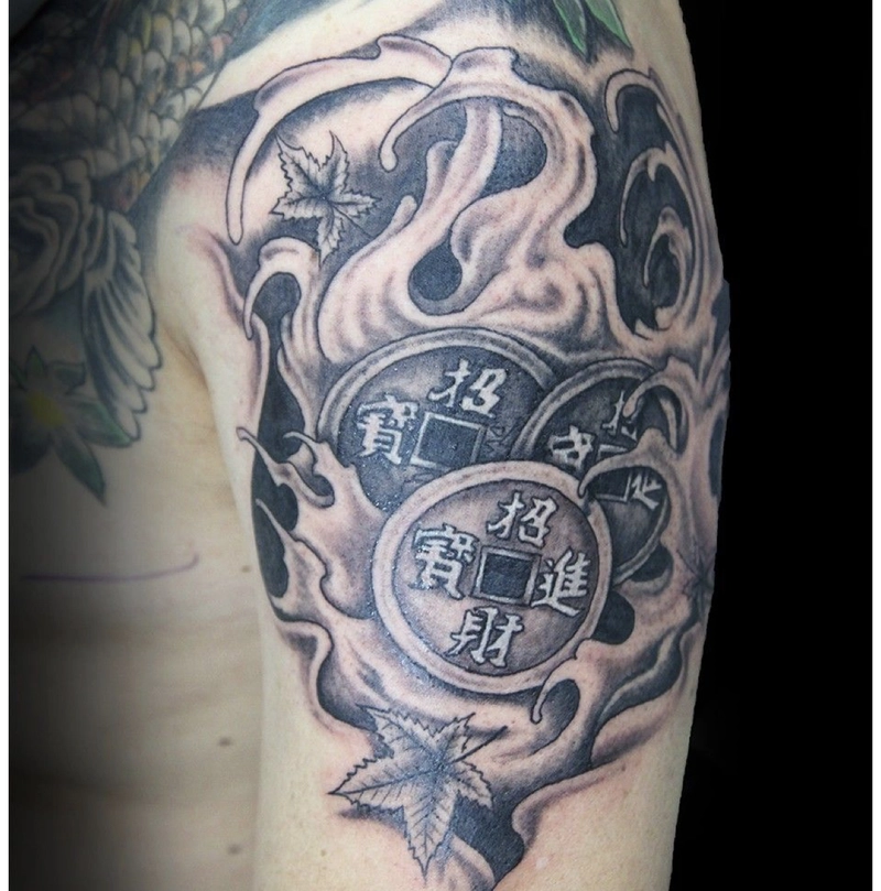Hình xăm đồng tiền cổ ý nghĩa đẹp