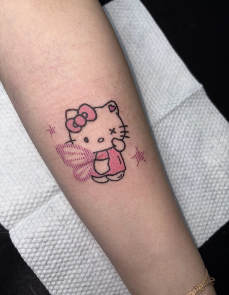 Hình xăm hello kitty hoa văn dễ thương cho nữ Hình xăm hello kitty hoa văn dễ thương cho nữ