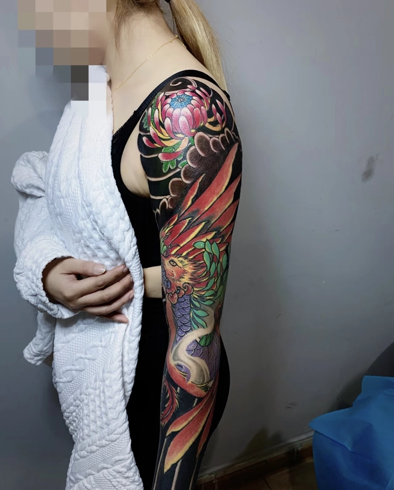 Hình xăm phượng hoàng bay lên trời