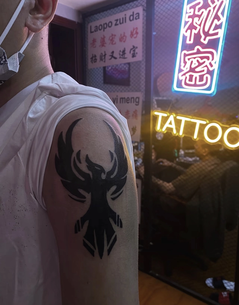 Hình xăm phượng hoàng kết hợp rồng phong thủy