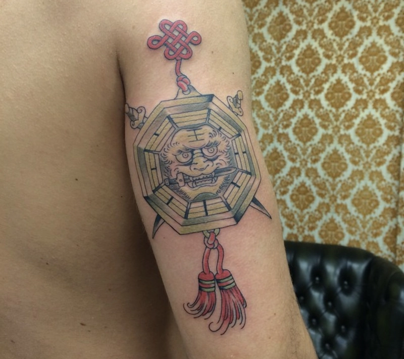 hình xăm bát quái thể hiện mối liên hệ giữa con người và trời đất