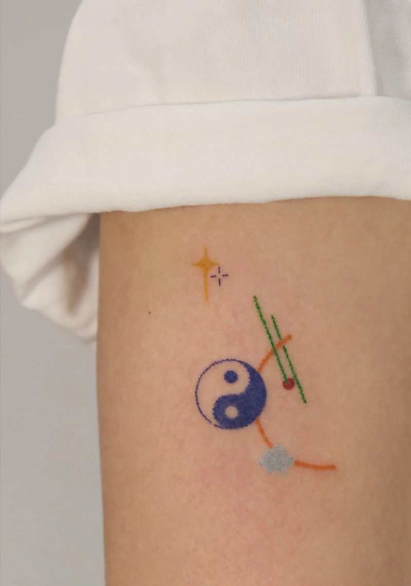 hình xăm bát quái tượng trưng cho sự hòa hợp vũ trụ