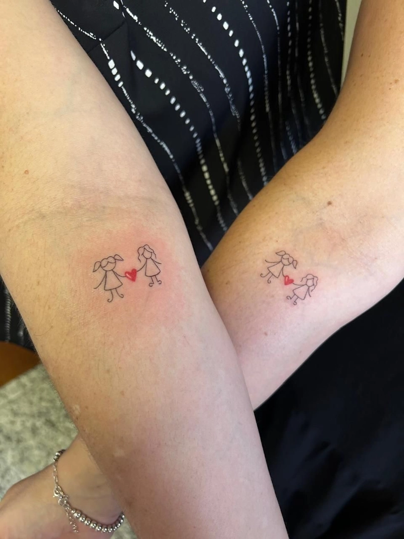 hình xăm đôi nữ ở tay