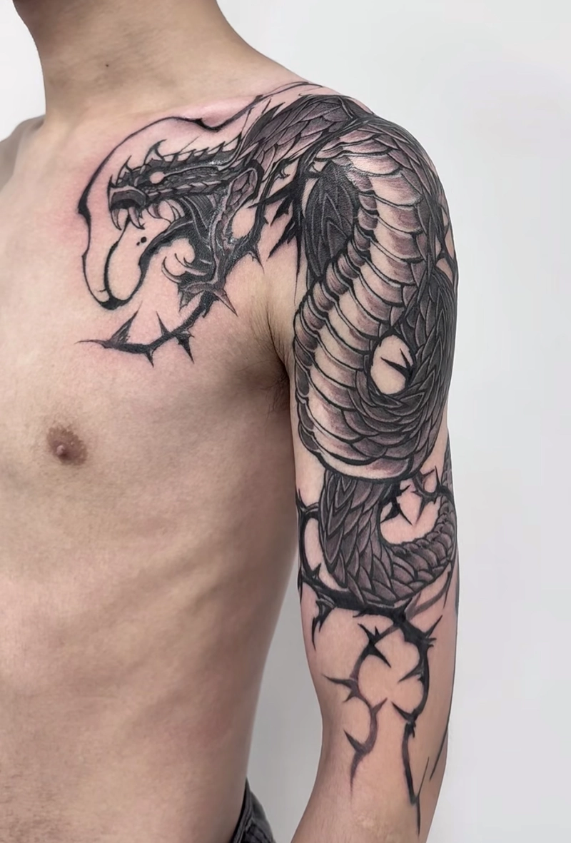 hình xăm ngầu cho nam ở bắp tay