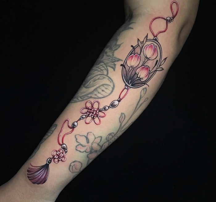 hình xăm phong thủy hợp mệnh tượng trưng cho hạnh phúc và viên mãn