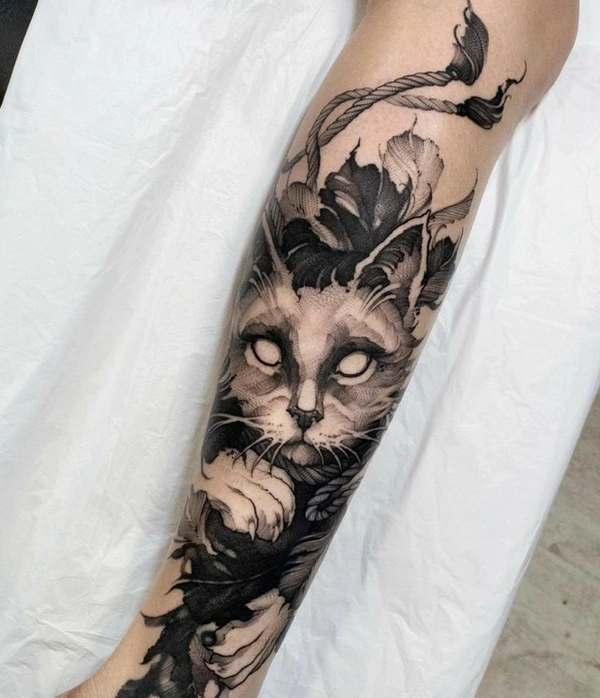 Hình xăm hoa lá kết hợp mèo thần tài