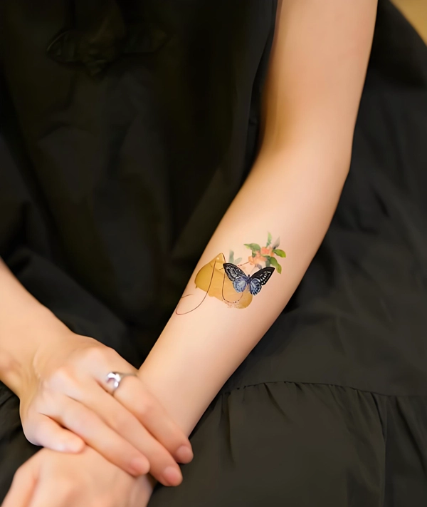 Hình xăm hoa lá kết hợp voi phong thủy