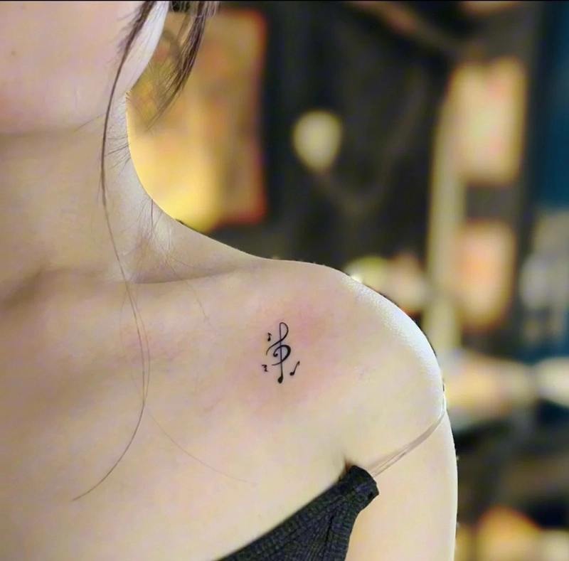 Hình xăm nốt nhạc nữ mang phong cách âm nhạc