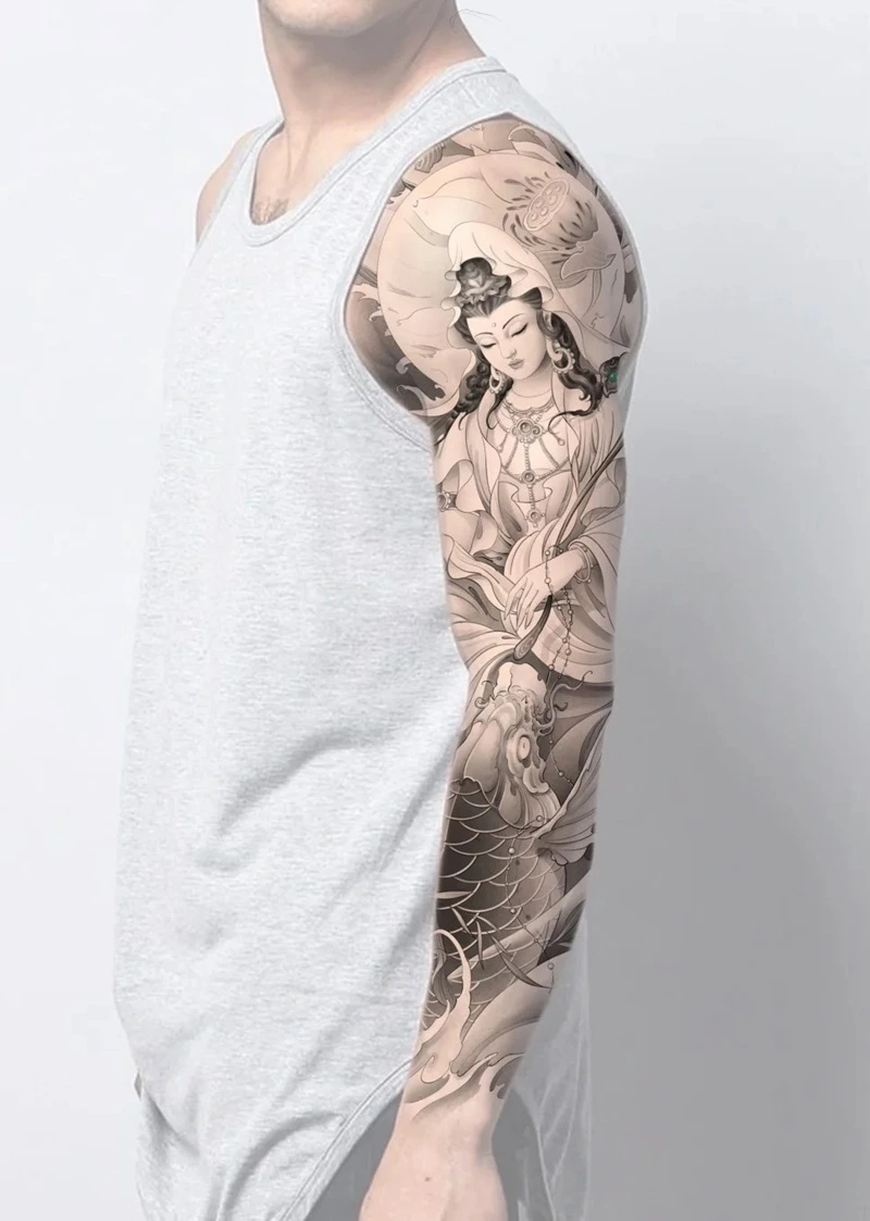 Tattoo Phật Bà Quan Âm mini ở cổ tay