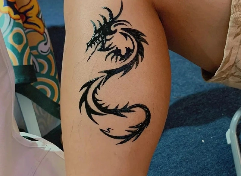 Hình xăm tượng rồng mini tinh tế dành cho giới trẻ 2025