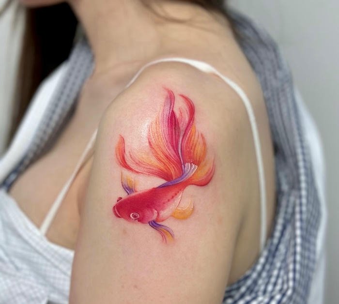 hình xăm cá chép đẹp cho nữ
