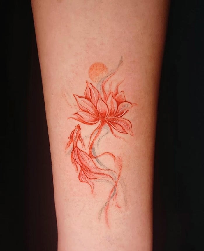 hình xăm cá chép đẹp ở tay nữ