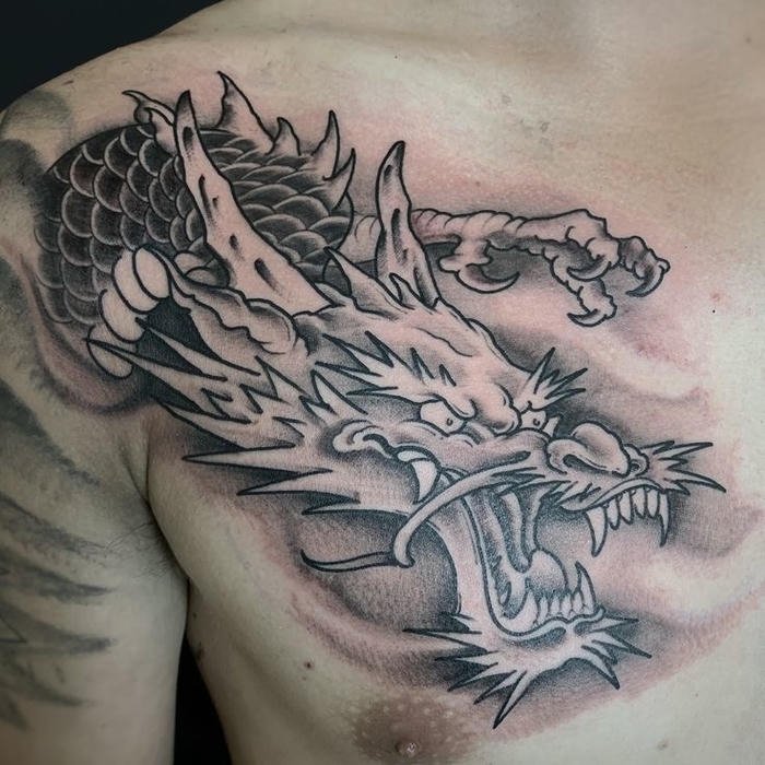 hình xăm đầu rồng mạnh mẽ nam