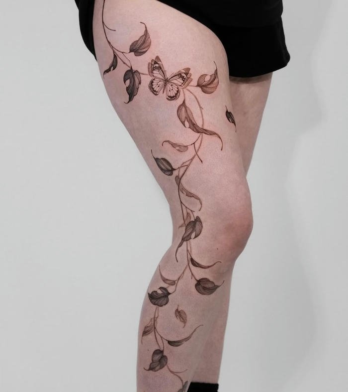 hình xăm lá cây full chân