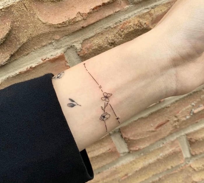 mẫu tattoo vòng tay phong cách nữ