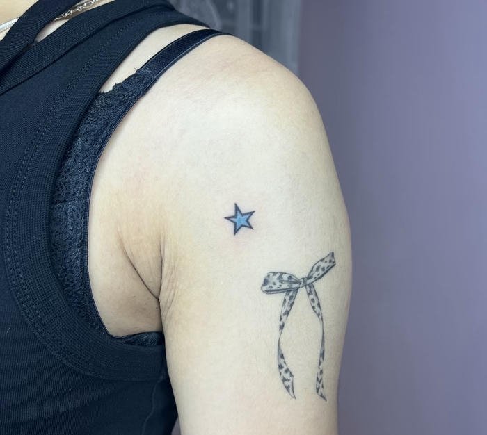 những hình xăm ngôi sao may mắn nữ những hình xăm ngôi sao may mắn nữ