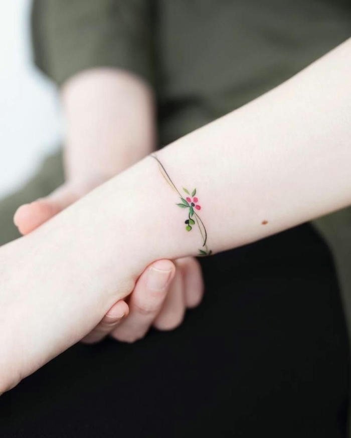 những hình xăm vòng tay nghệ thuật cho nữ