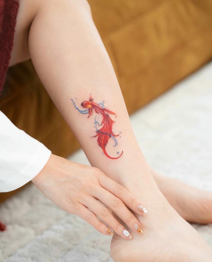 tattoo cá chép đẹp cho nữ