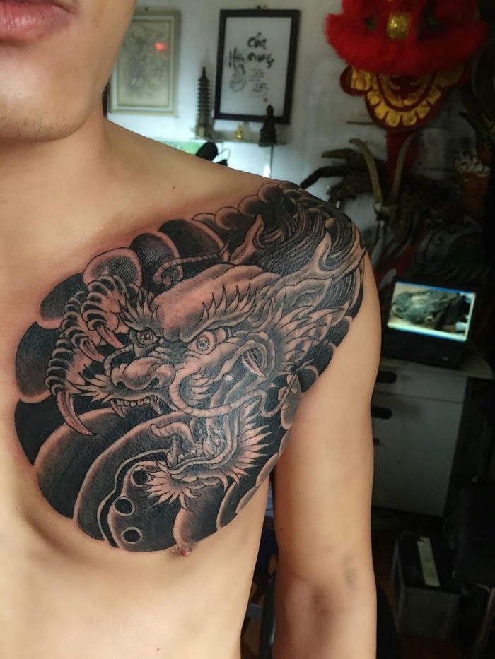 tattoo đầu rồng tượng trưng quyền lực nam