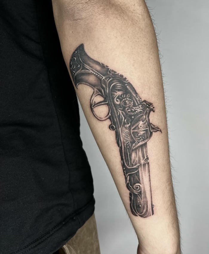 tattoo kim loại nam đậm chất nghệ thuật